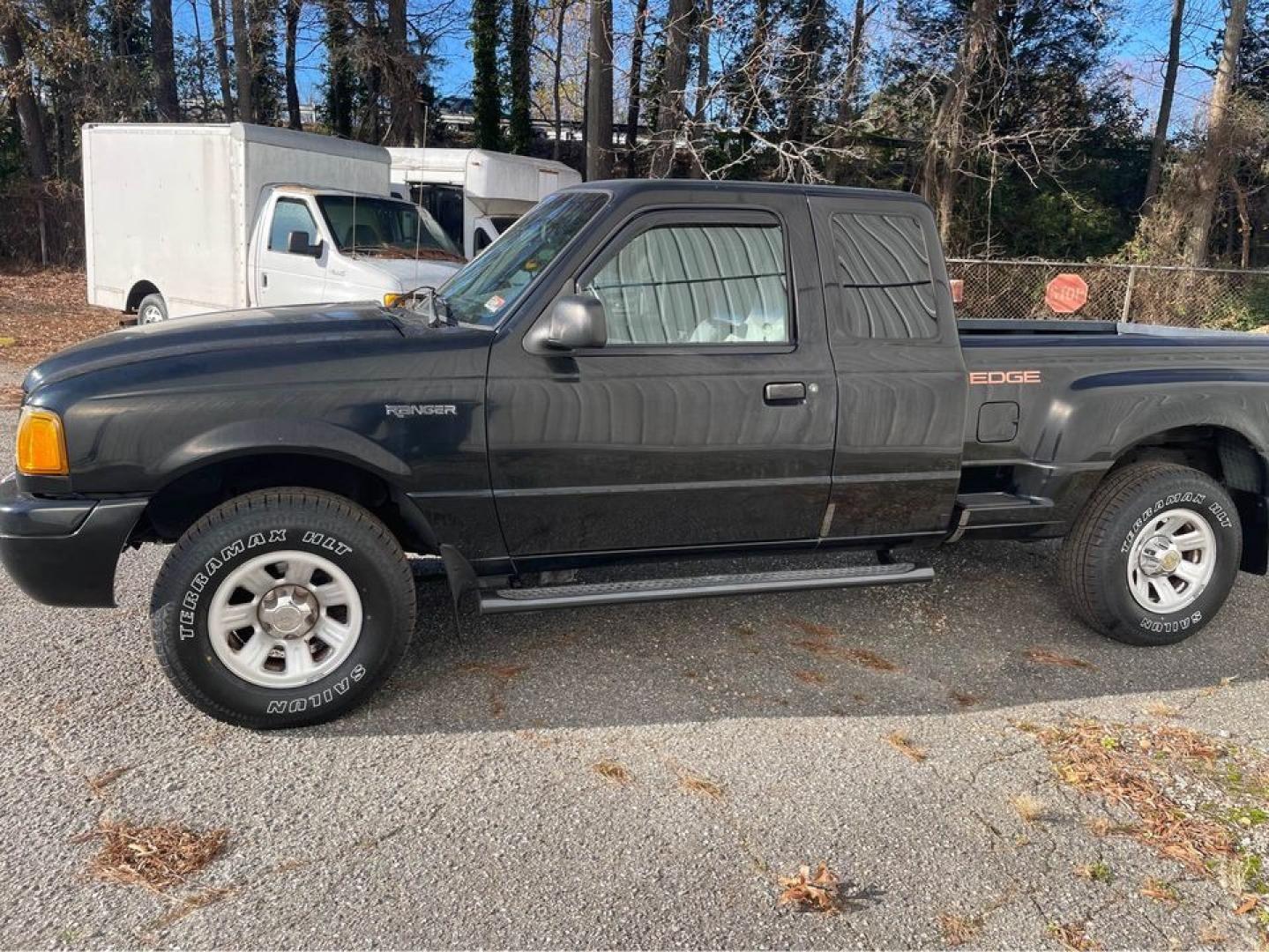 2002 Black /gray Ford Ranger (1FTYR14U72T) with an 3.0 V6 engine, Automatic transmission, located at 5700 Curlew Drive, Norfolk, VA, 23502, (757) 455-6330, 36.841885, -76.209412 - Photo#4